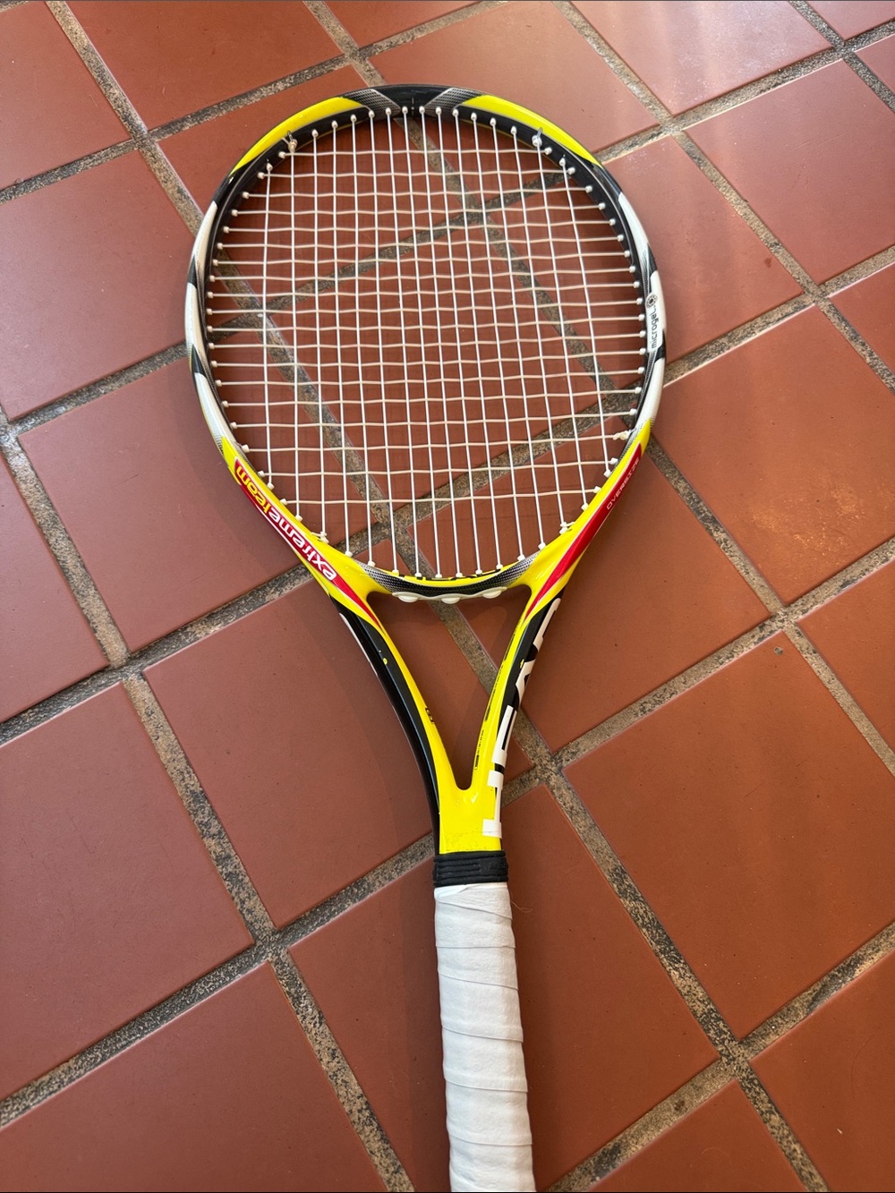 HEAD Yellow Black Tennis Racket with Red Accents